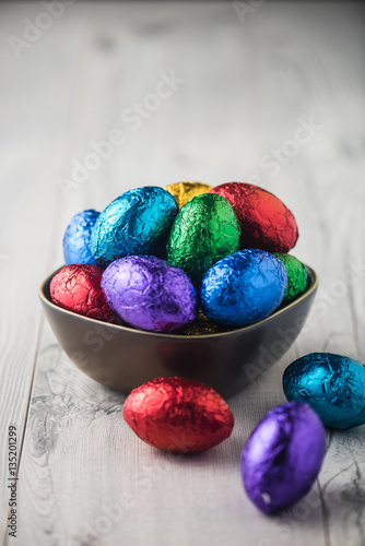 Colourful easter eggs in metallic wrapping