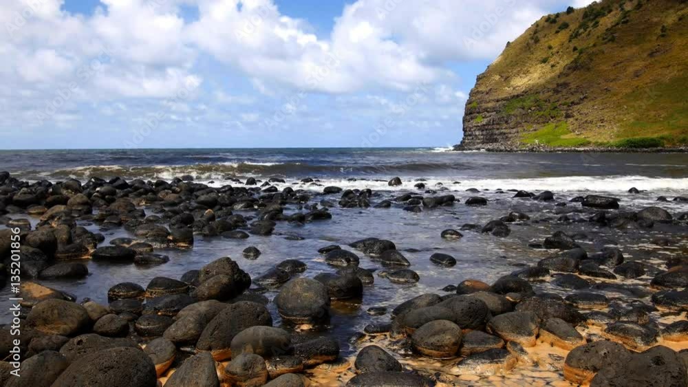 A rocky shoreline in Hawaii highlights the lush nature of the islands driven in part by plentiful rainfall.. A rocky shoreline in Hawaii highlights the lush nature of the islands driven in part by plentiful rainfall..