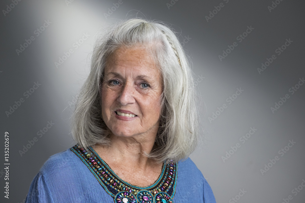 Portrait of a smiling senior aged woman Portrait of a smiling senior aged woman