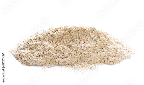 pile whole grain barley flour isolated on white background