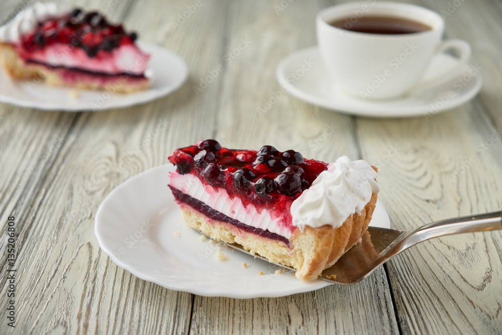 Cake dessert with cream, currants, cherries and coffee Cake dessert with cream, currants, cherries and coffee