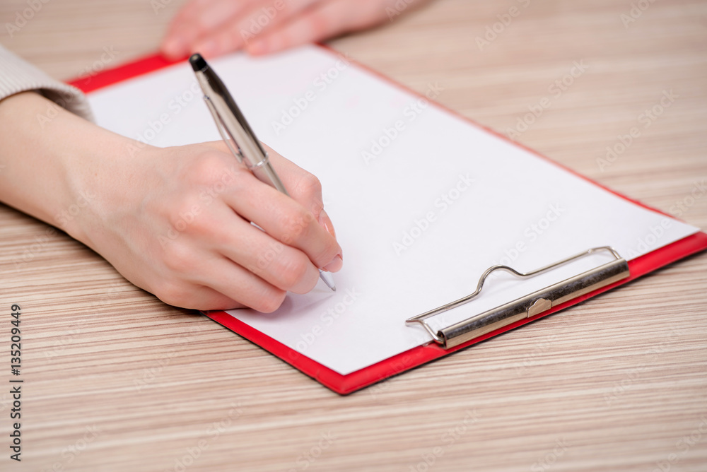 Hand writing memo in business concept