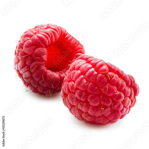 Two isolated berry. Fresh raspberry fruit on white background with clipping path. Macro. Close up.