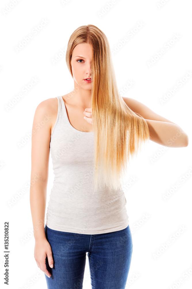 Blond hair. Beautiful woman with straight long hair. Blond hair. Beautiful woman with straight long hair.