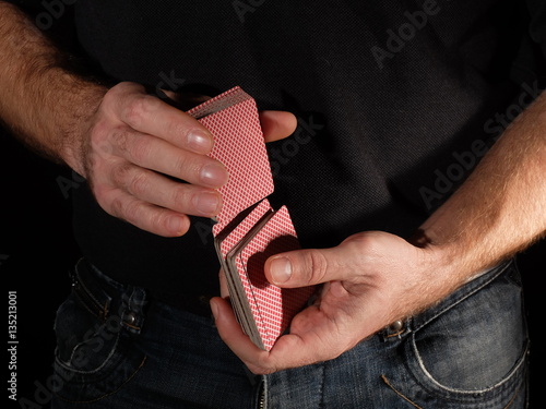 Playing cards on black background