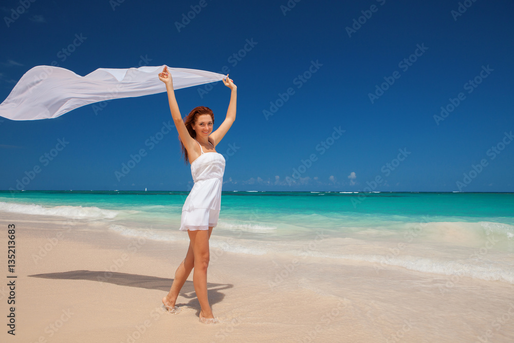 Fashion woman walking on the beach. Happy lifestyle. White sand, Fashion woman walking on the beach. Happy lifestyle. White sand,