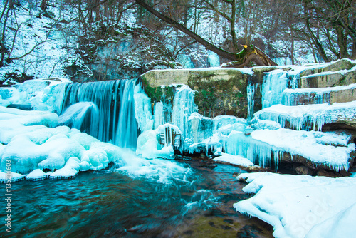 Amazing frozen waterfall photo