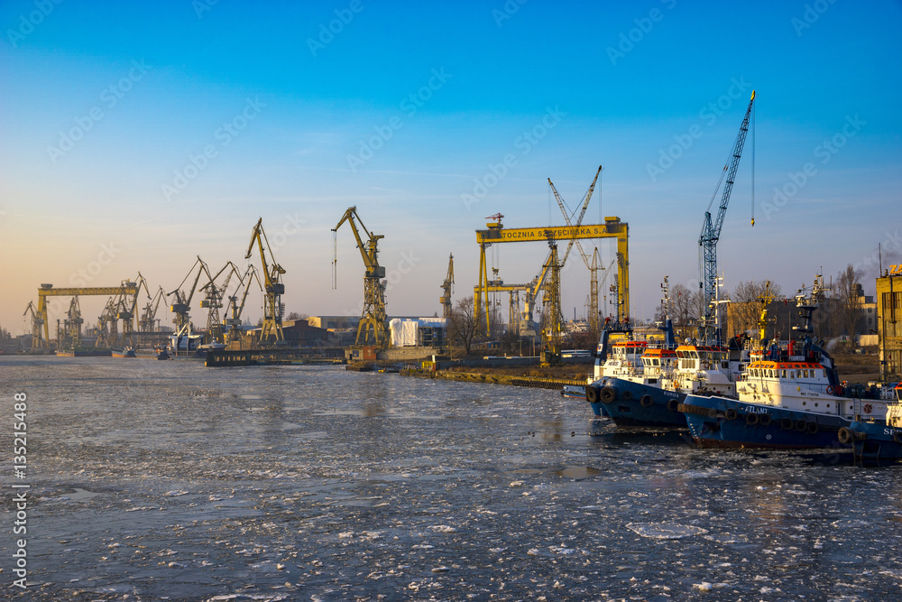 tugboats in the frozen port