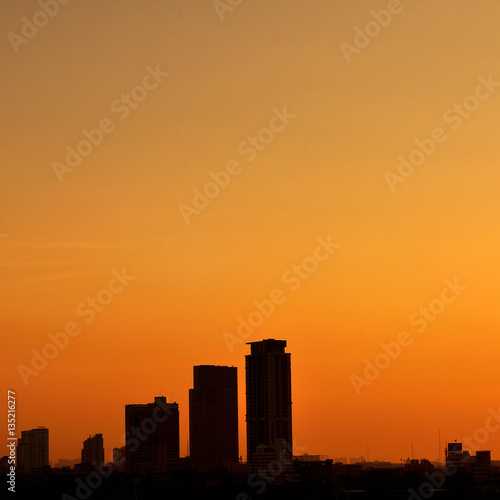 Cityscape building silhouette in twilight time.