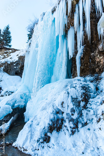 Frozen waterfall in carpathian mountains