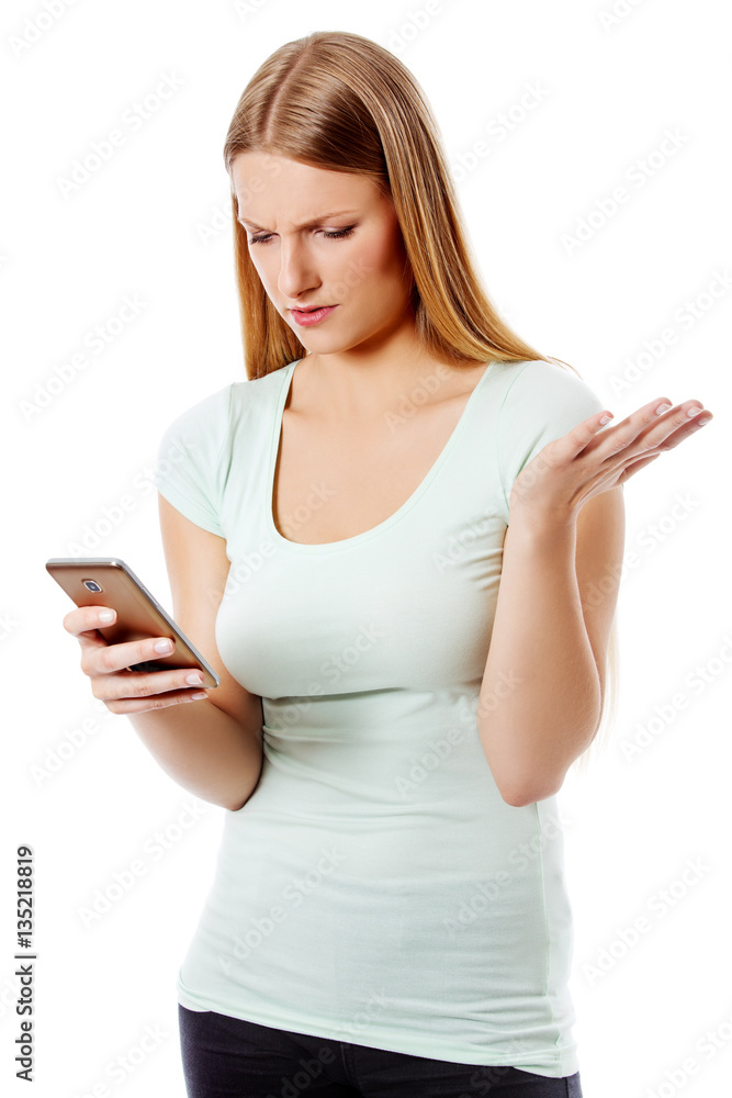Woman sending a sms on cell phone, isolated on white. Woman sending a sms on cell phone, isolated on white.