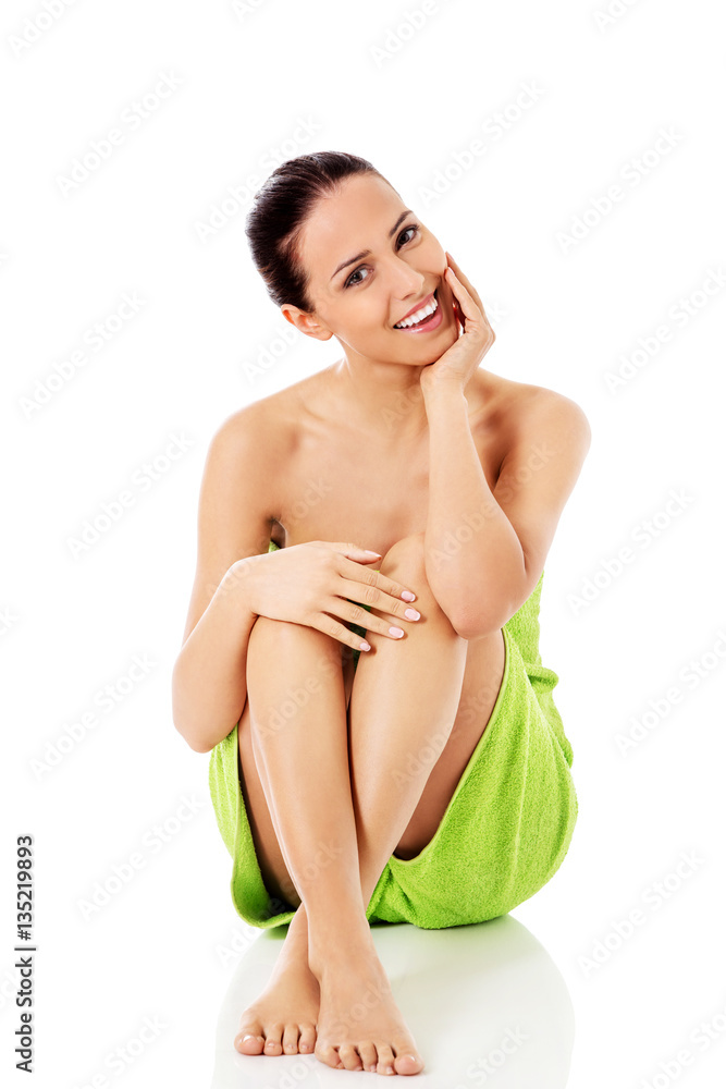 Obraz premium Young beautiful woman after bath full portrait isolated over white.