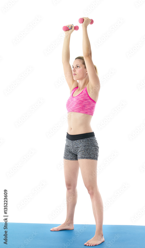 Naklejka premium Sportowa kobieta robi ćwiczenia z hantlami