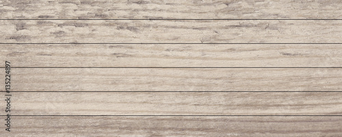 Grey scratched wood planks texture with natural pattern. Table, fence or floor surface