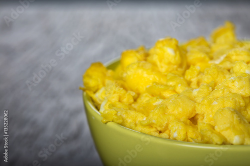 Bowl filled with scrambled eggs