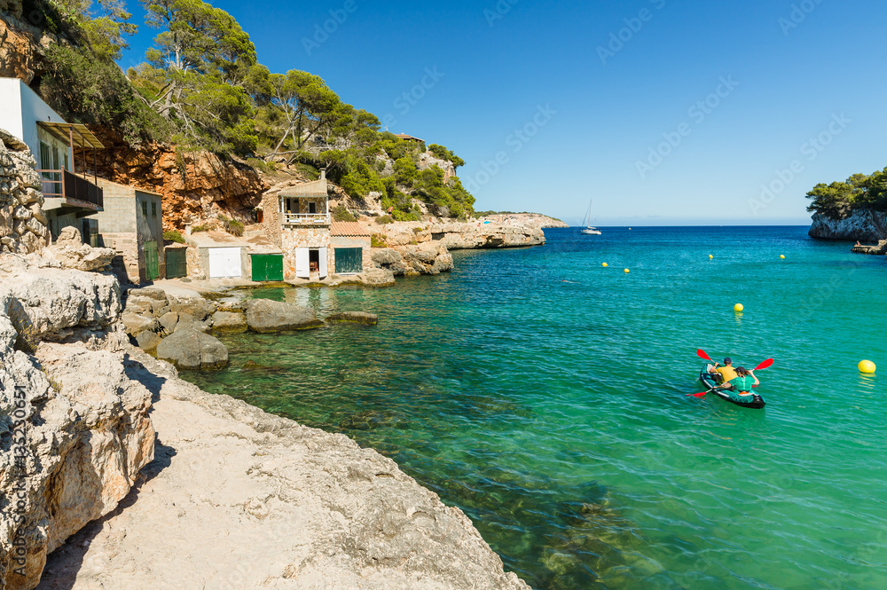 Cala Llombards. Beautiful beach that is sheltered on either side by cliffs. Mallorca island, Spain.