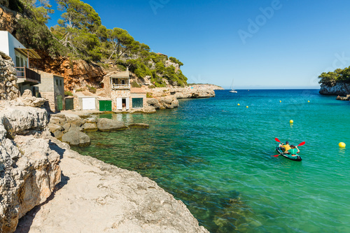 Obraz na płótnie Cala Llombards. Beautiful beach that is sheltered on either side by cliffs. Mallorca island, Spain. w salonie