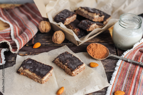 Homemade healthy snack sweets - energy nut bars. Sugar-free, gluten-free, without baking. Selective focus