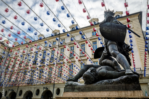 Turin (Italy), Piazza Palazzo di CittÃ  (Town Hall Square) with the monument in memory of Amedeo VI of Savoia, also known as the Green Count photo