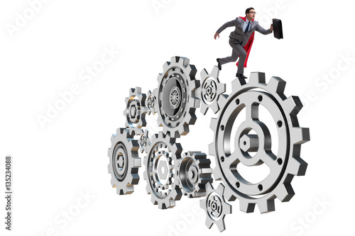 Businessman in teamwork concept with cogwheels photo