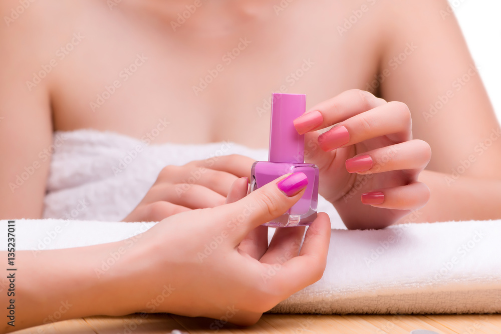 Woman hands during manicure session Woman hands during manicure session