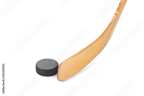 Ice hockey stick and puck