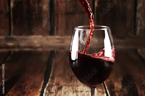 Close up of pouring wine in glass
