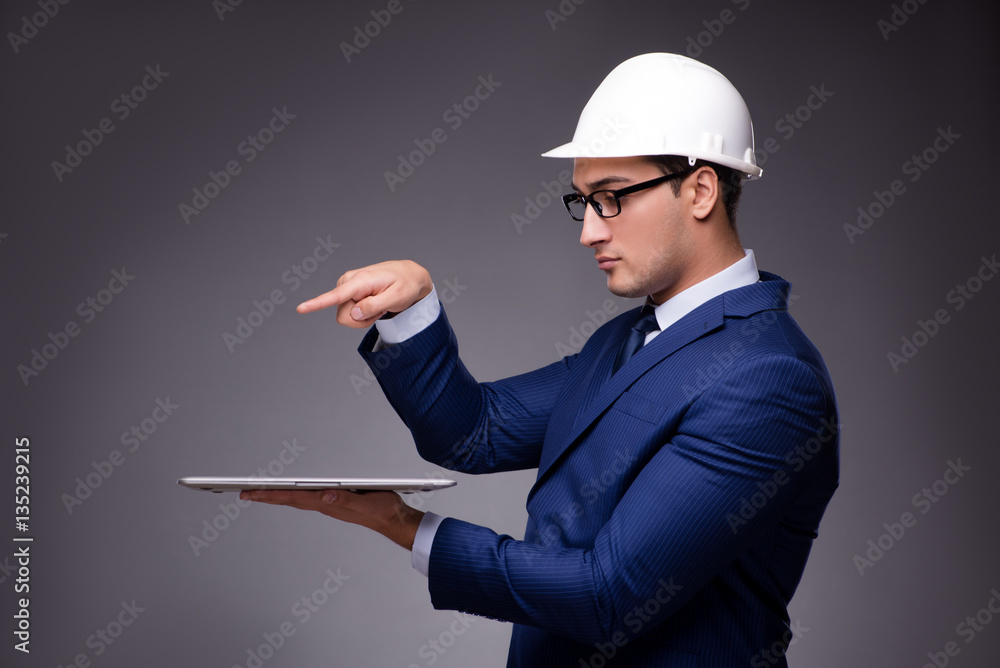 Young architect in industrial concept