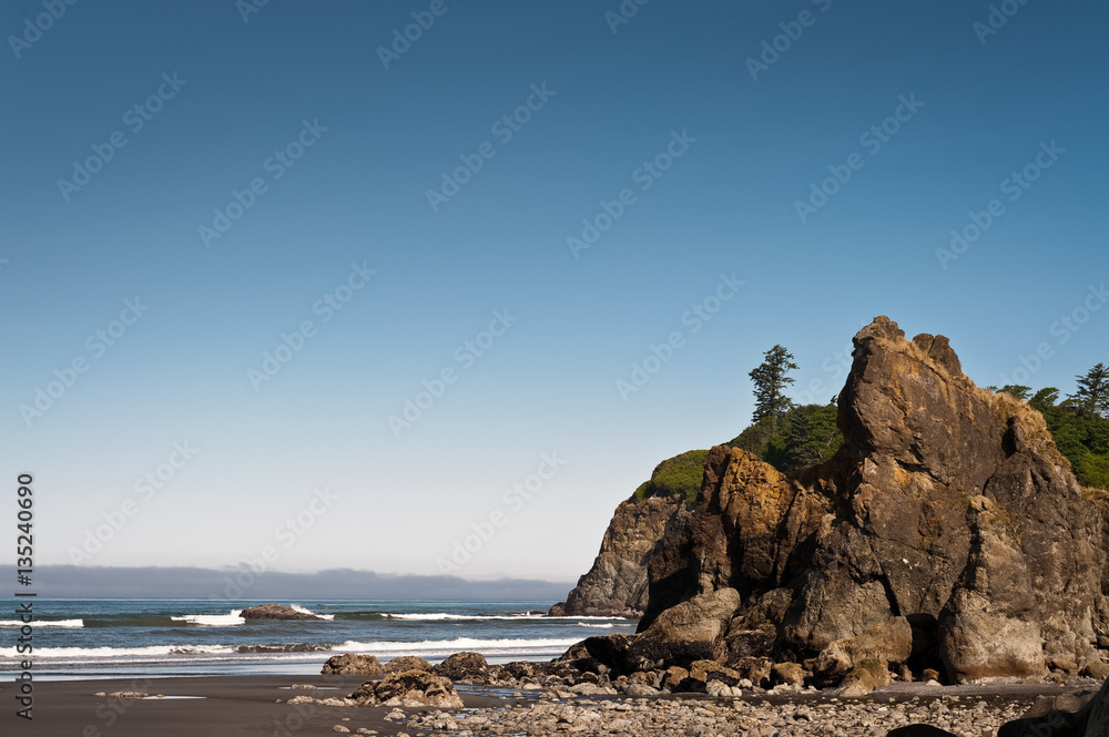 rocks and waves in quiet beach of Ruby Beach