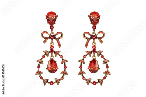 Jewelry on a white background. Women's earrings premium with precious stones. Isolate Jewelry.