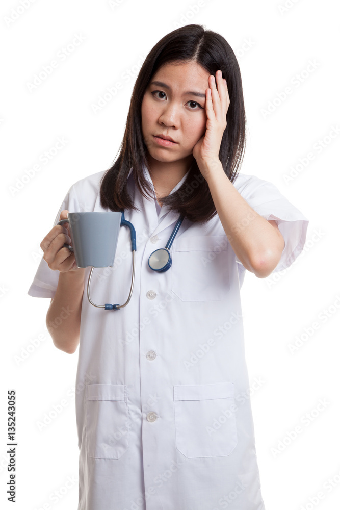Portrait of Asian young female doctor got headache. Portrait of Asian young female doctor got headache.