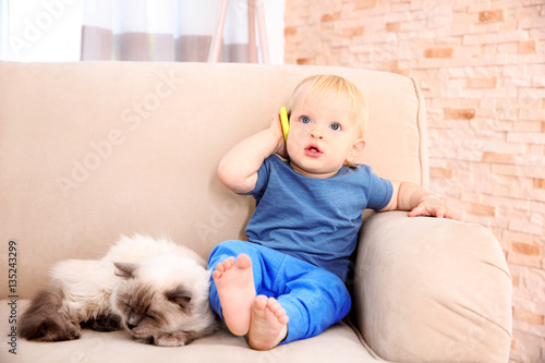Cute little boy with fluffy...