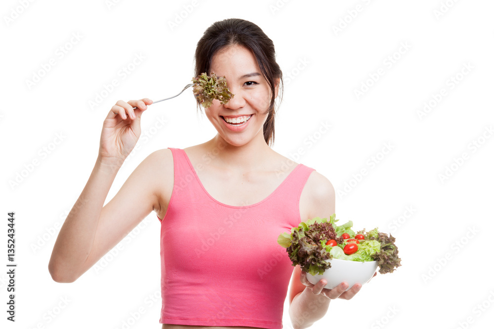 Beautiful Asian healthy girl enjoy eating salad. Beautiful Asian healthy girl enjoy eating salad.