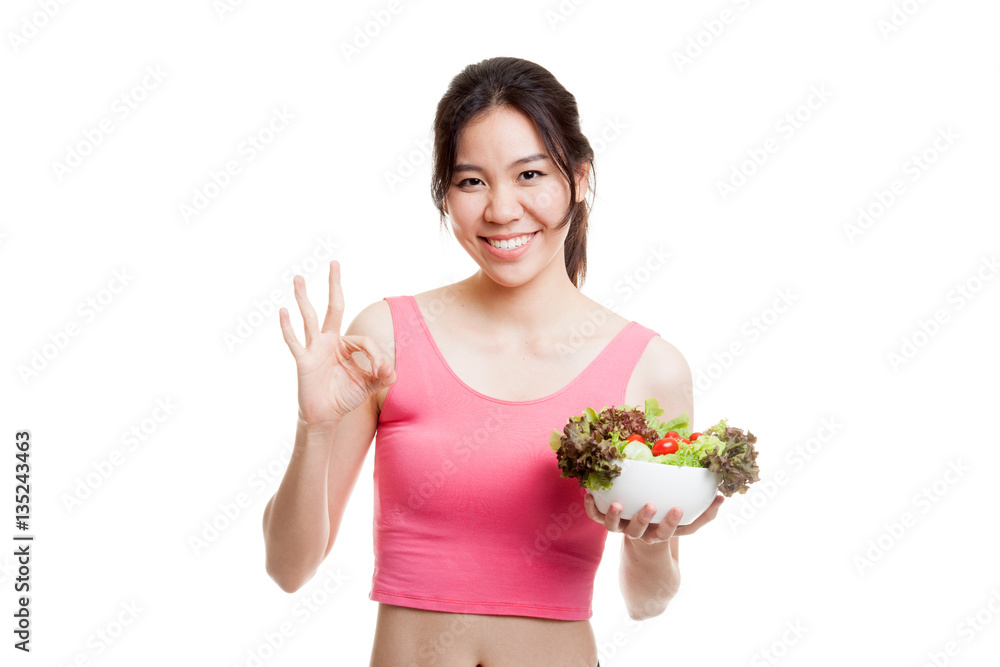 Beautiful Asian healthy girl show OK with salad. Beautiful Asian healthy girl show OK with salad.
