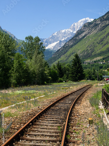 old abandoned railroad tracks between the mountains © lucag_g
