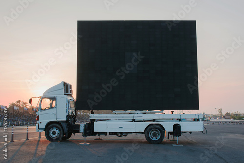  billboard on a truck LED panel for sign Advertising at twilight sky sunset background, for an advertisement