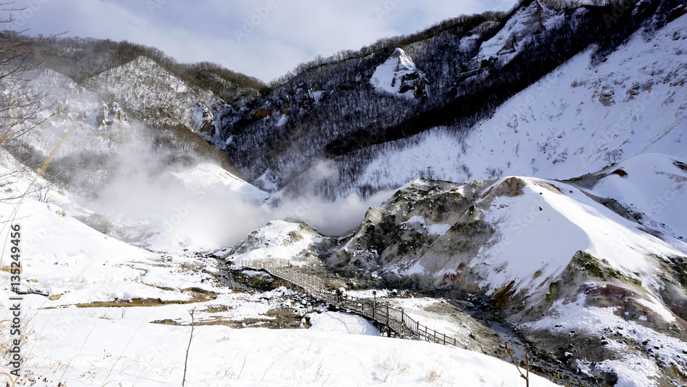 Fototapeta premium Noboribetsu onsen and bridge hell valley snow winter viewpoints