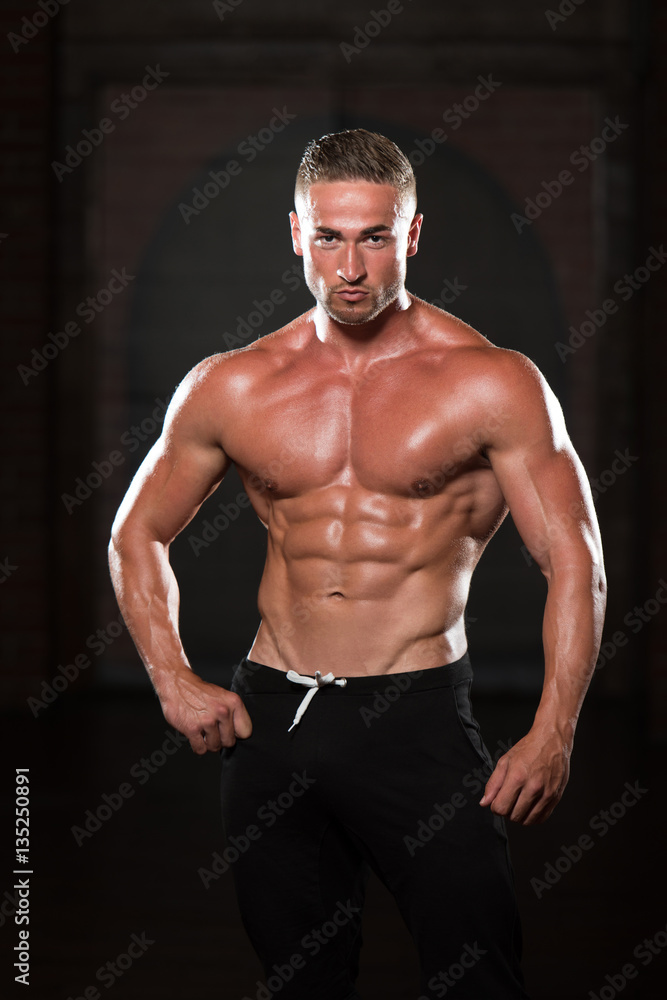 Young Man Showing Abdominal Muscle