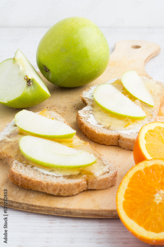 toast with jam and apple close-up on a white background toast with jam and apple close-up on a white background