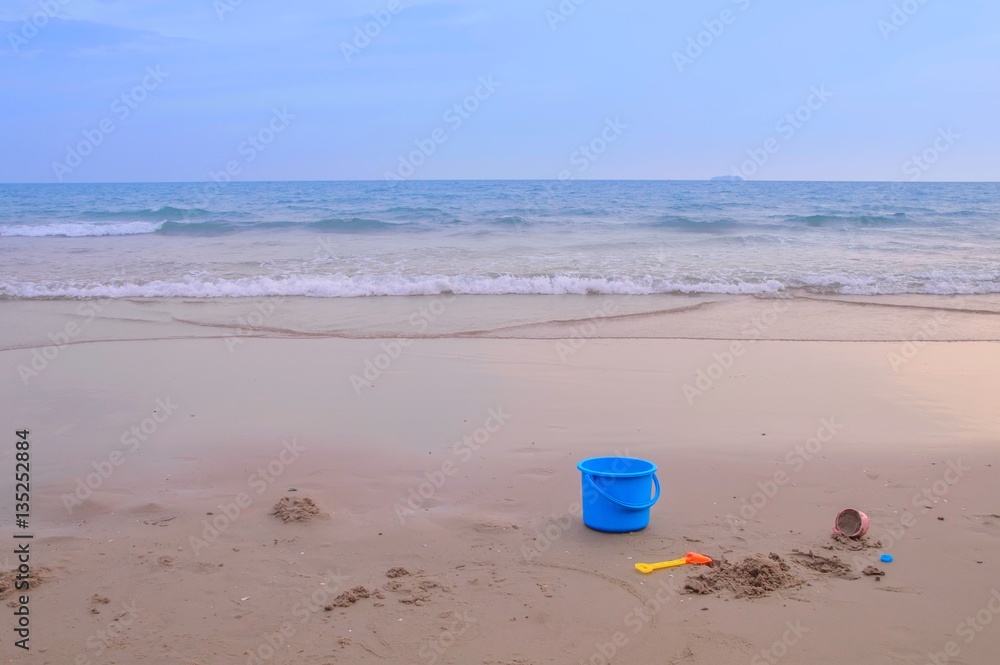Children's toy on the beach for summer background Children's toy on the beach for summer background