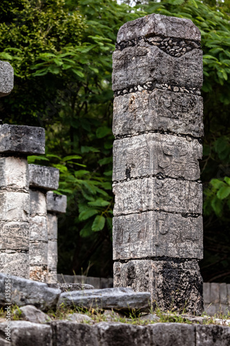 Carved column at the Temple of a Thousand Warriors in the Chichen Itza archaeological site in Yucatan, Mexico.