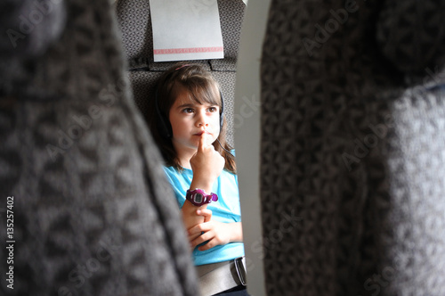 Quadro em tela Plane passenger child watching inflight movie