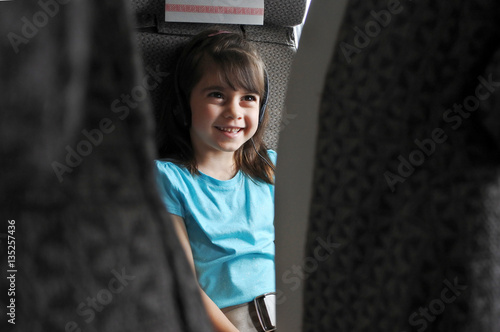 Billede på lærred Plane passenger child watching inflight movie