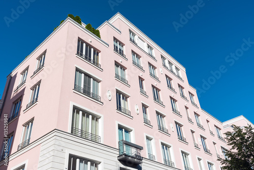 Modern pink apartment house seen in Berlin, Germany