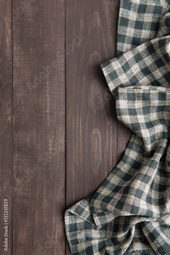 Napkin on the wooden background. Top view
