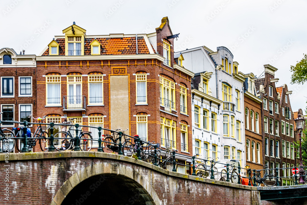 Historic houses with Bell Gables and Neck Gables dating back to the Middle Ages along the canals of Amsterdam