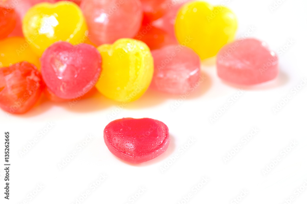Candy heart for sweet love in white dish on Valentine's day Candy heart for sweet love in white dish on Valentine's day