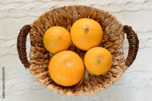 Decorative pumpkin in a basket
