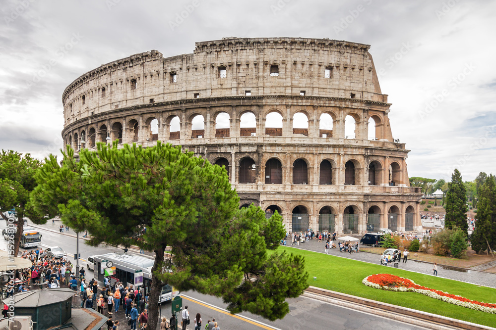 Cloudy view of ancient amphitheater Colosseo in Rome, Lazio region, Italy.