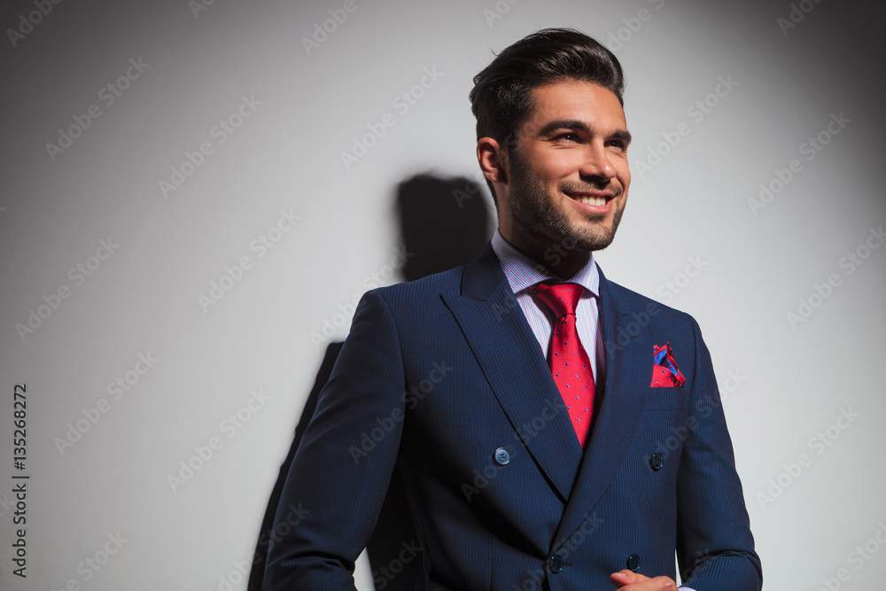 side view of a laughing gentleman in elegant suit side view of a laughing gentleman in elegant suit
